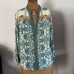 Size L blouse w/a cream,orange , turquoise flower motif